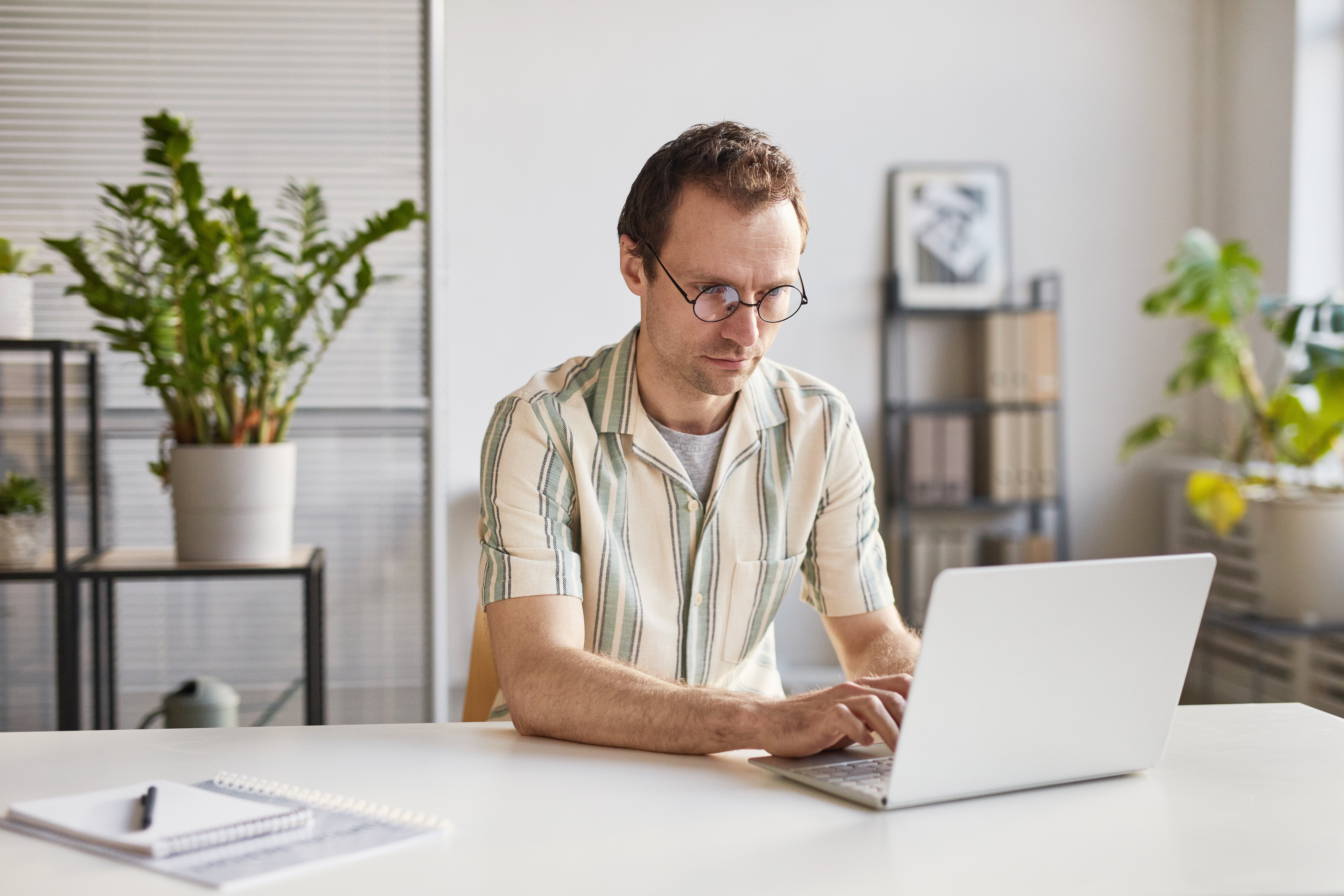 man-working-on-laptop-2022-01-04-21-03-46-utc