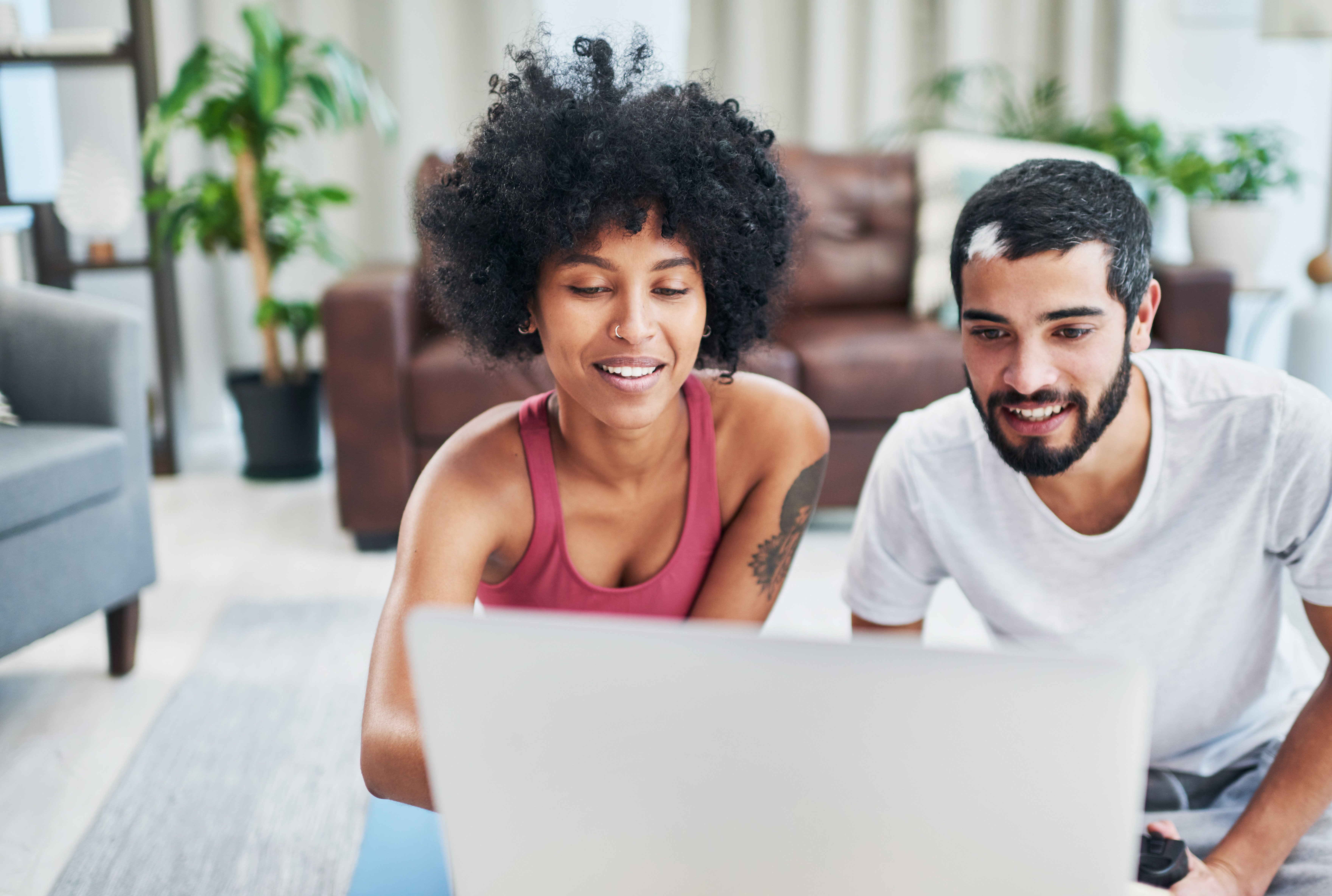 shout-of-a-young-couple-using-a-laptop-while-worki-2022-09-14-00-34-12-utc